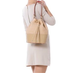 Arcadia made in Italy woven patent leather round bag